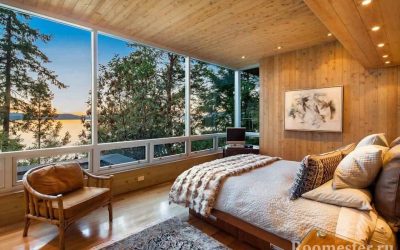 Camera da letto in una casa di legno - design e foto