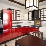 Röda möbler i en vit kökinre