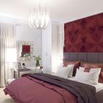 Burgundy wall in the bedroom interior