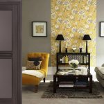 Yellow accents in gray room design