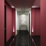 The combination of burgundy walls and dark floors