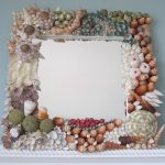 Frame decorated with shells of different sizes