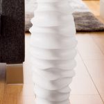 White vase in the style of the avant-garde