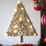 Christmas tree made of wood cuts on the wall