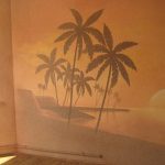 Sea with palm trees on the wallpaper