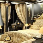 Interior dormitor în negru și auriu