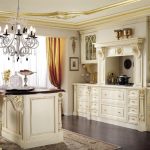 White furniture with gold patterns in the kitchen