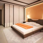 Wit-oranje slaapkamer interieur
