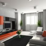 Orange dekor i et lyst interiør