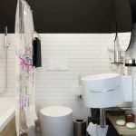 Kontrasten mellan svart och vitt i badrummet