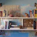 Maps and shelf on the wall