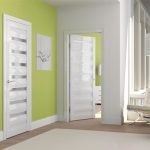 Green wallpapers and white doors