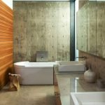 Bathroom with concrete and wood walls