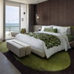 Green carpet in the bedroom