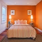 Slaapkamer in oranje tinten.