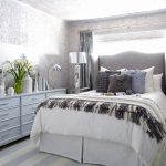 High white bed in a gray room