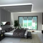 Black and white striped ceiling over the bed.