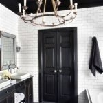 Stylish bathroom with black ceiling