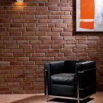 Armchair by the brick wall