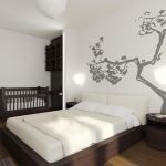 תפאורה קיר יפה בחדר השינה עם מיטת תינוק