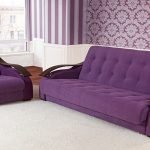Matala violetti sohva ja nojatuoli