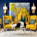 Mustard armchairs in blue interior