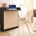 Dresser with a table in the nursery