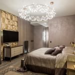 Beige bedroom with chandelier