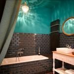 Turquoise walls and ceiling in the bathroom