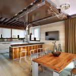 Laminate on the floor and walls of the kitchen-dining room