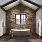 Contemporary bathroom design with decorative stone trim