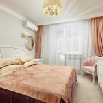Coral color in the decor of the bedroom