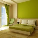 La combinazione di verde e beige all'interno della camera da letto