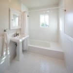 Bathroom with white floors