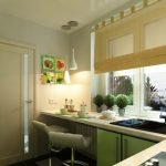 Kitchen in green and beige tones