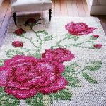 Teppe med roser på gulvet