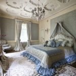 Gold and silver tones in the design of the bedroom