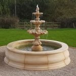 Multi-level fountain with integrated pump