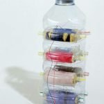 Plastic bottle for storing threads
