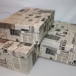 Newspaper as a decor of storage boxes
