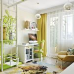 Cortines verdes en una habitació per a un adolescent