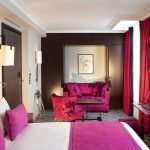 Fuchsia color in the interior of a large bedroom
