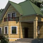 Hus med ett grönt tak