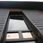 Wood-polymer composite in facade decoration