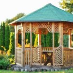 Wooden arbor with green roof