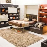 The combination of orange and brown in the interior of the bedroom