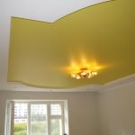 White and yellow satin stretch ceiling