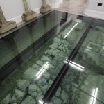 Ancient stones under glass