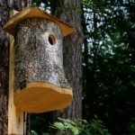 Homemade log birdhouse
