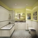 Carrelage noir et blanc sur le sol de la salle de bain